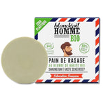 Un Pain de rasage bio homme Blondépil au Beurre de karité & amande douce avec son emballage carton