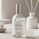 Un spray d'ambiance au musc blanc de la marque Drake