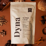 un sachet de super chaï de la marque dyna avec ses ingrédients disposés tout autour