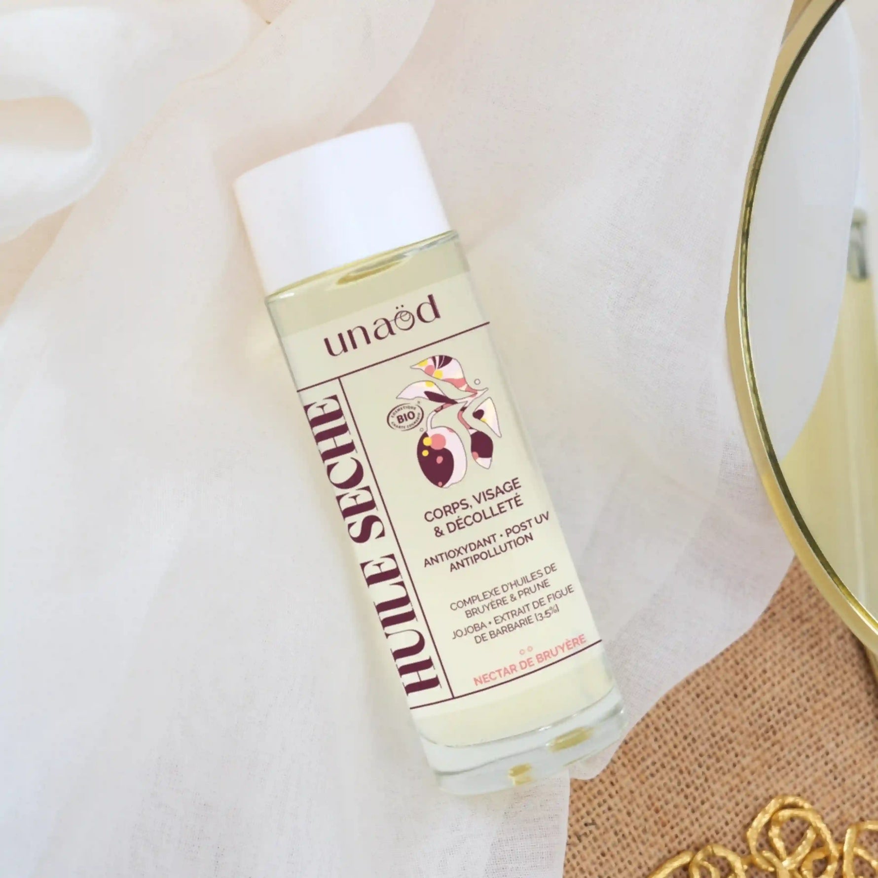 Un flacon de 100ml d'Huile Sèche Corps & Visage « Nectar de Bruyère »  Unaöd