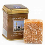 Un carré d'ambre musc blanc de la marque Hemani avec sa boite