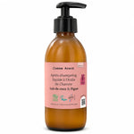 Flacon en verre ambré avec pompe noire de l'après-shampoing Comme Avant à l'huile de chanvre, lait de coco et figue, 200 ml, sur fond blanc