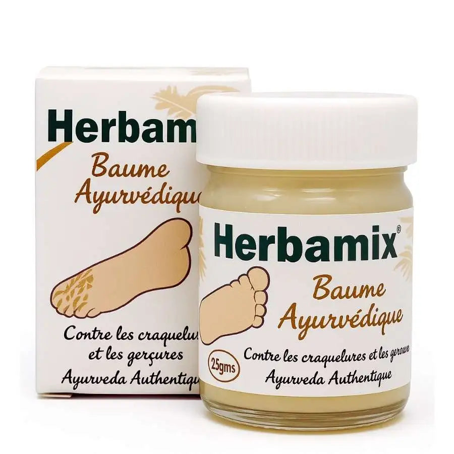 Un Baume Ayurvédique Herbamix pour les Pieds, Mains & Lèvres avec son emballage carton
