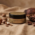 Beurre de karité brut bio Najel 100g avec ingrédients naturels sur tissu beige
