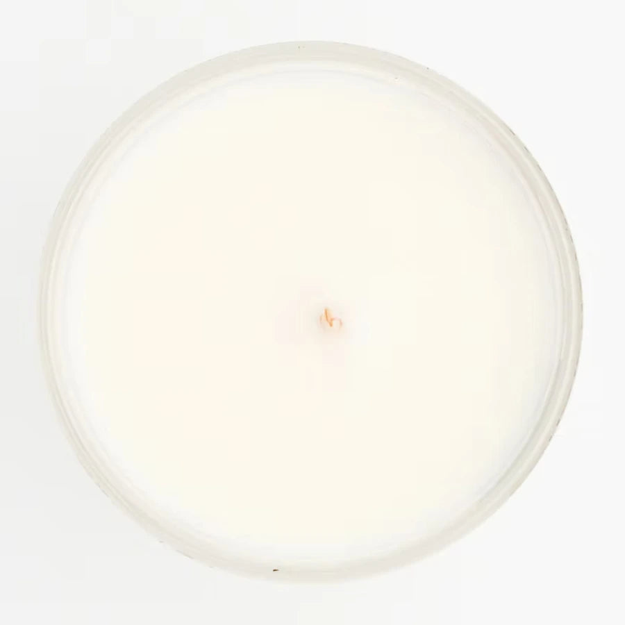 Une bougie naturelle joie de 110g de la marque jolis baume vu du dessus. 