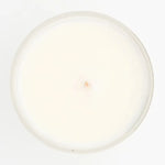 Une bougie naturelle joie de 110g de la marque jolis baume vu du dessus. 