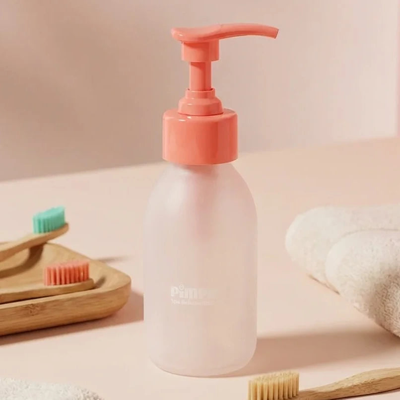 Bouteille verre rechargeable 80ml dentifrice enfant Pimpant pompe corail fond rose
