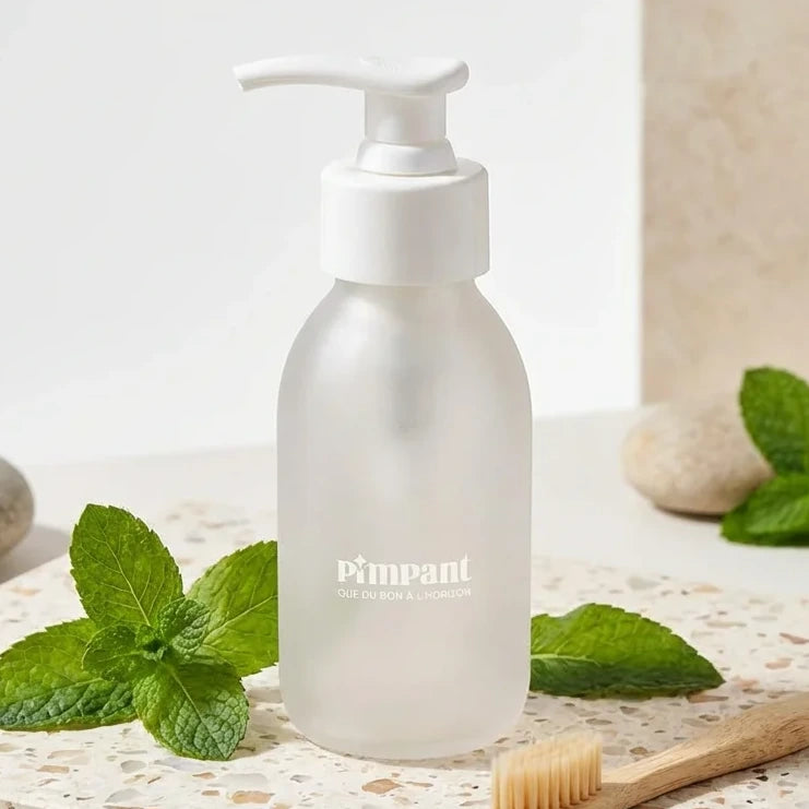 Bouteille verre rechargeable dentifrice 80ml Pimpant pump blanc sur surface marbre