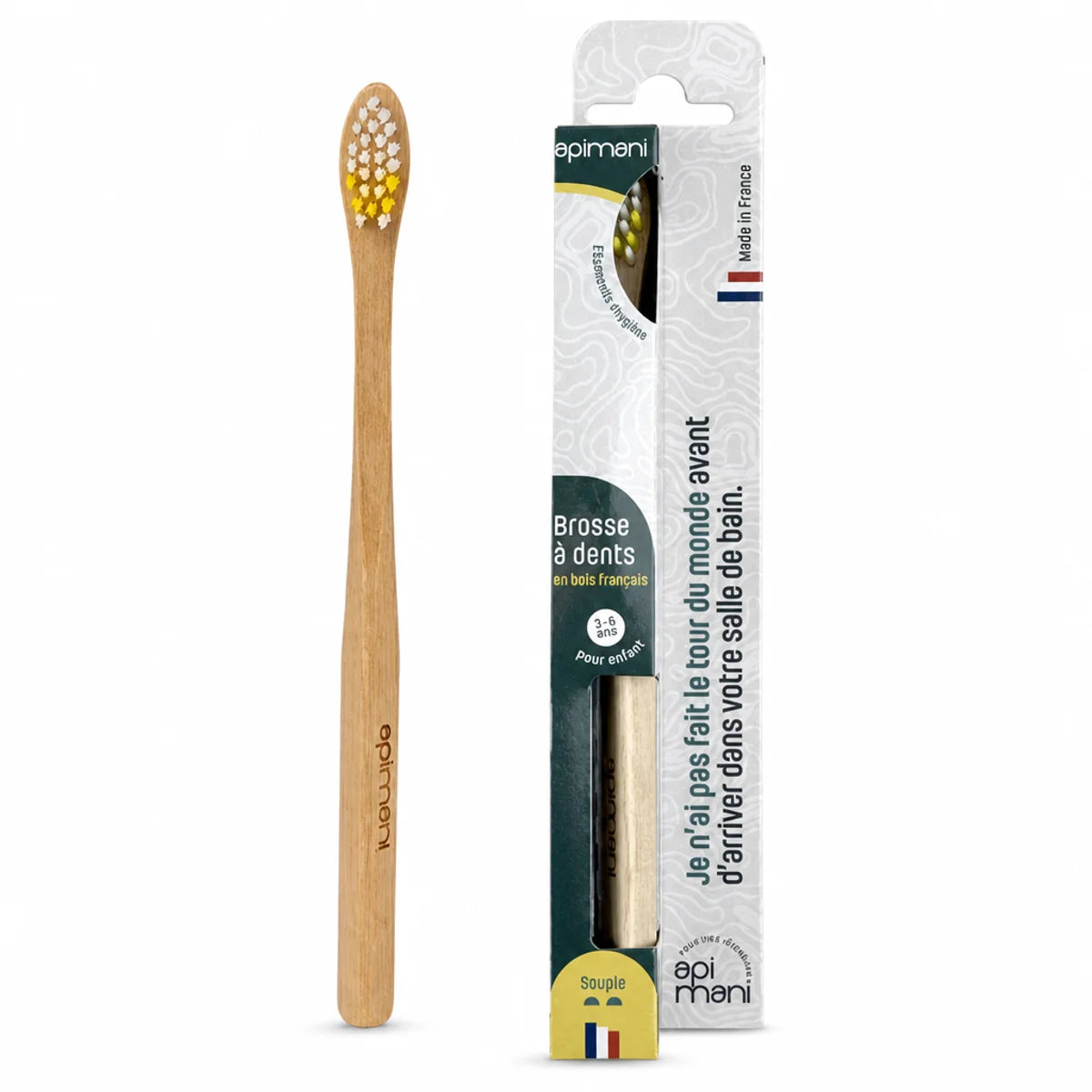 Brosse à dents en bois Apimani pour enfant avec soies jaunes et packaging vert