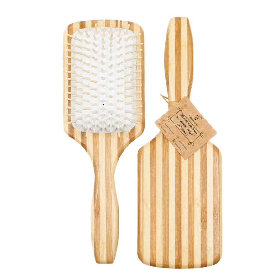 Une brosse à cheveux démêlante large de la marque Cap Bambou, vue des deux côtés