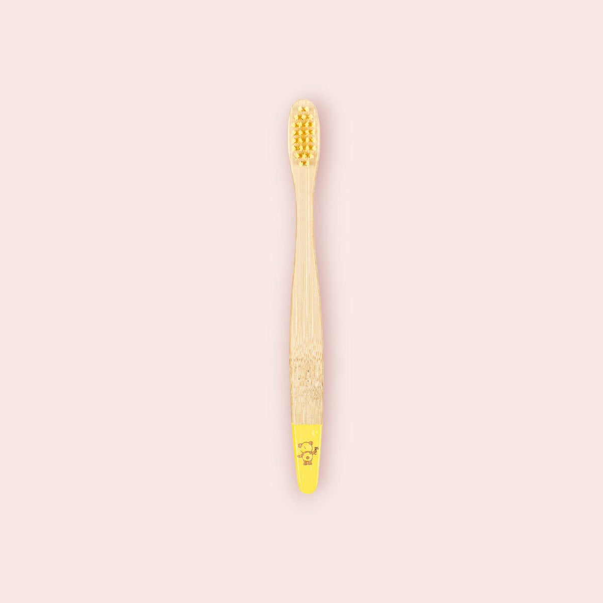  Une brosse à dents enfant jaune de la marque Cap Bambou
