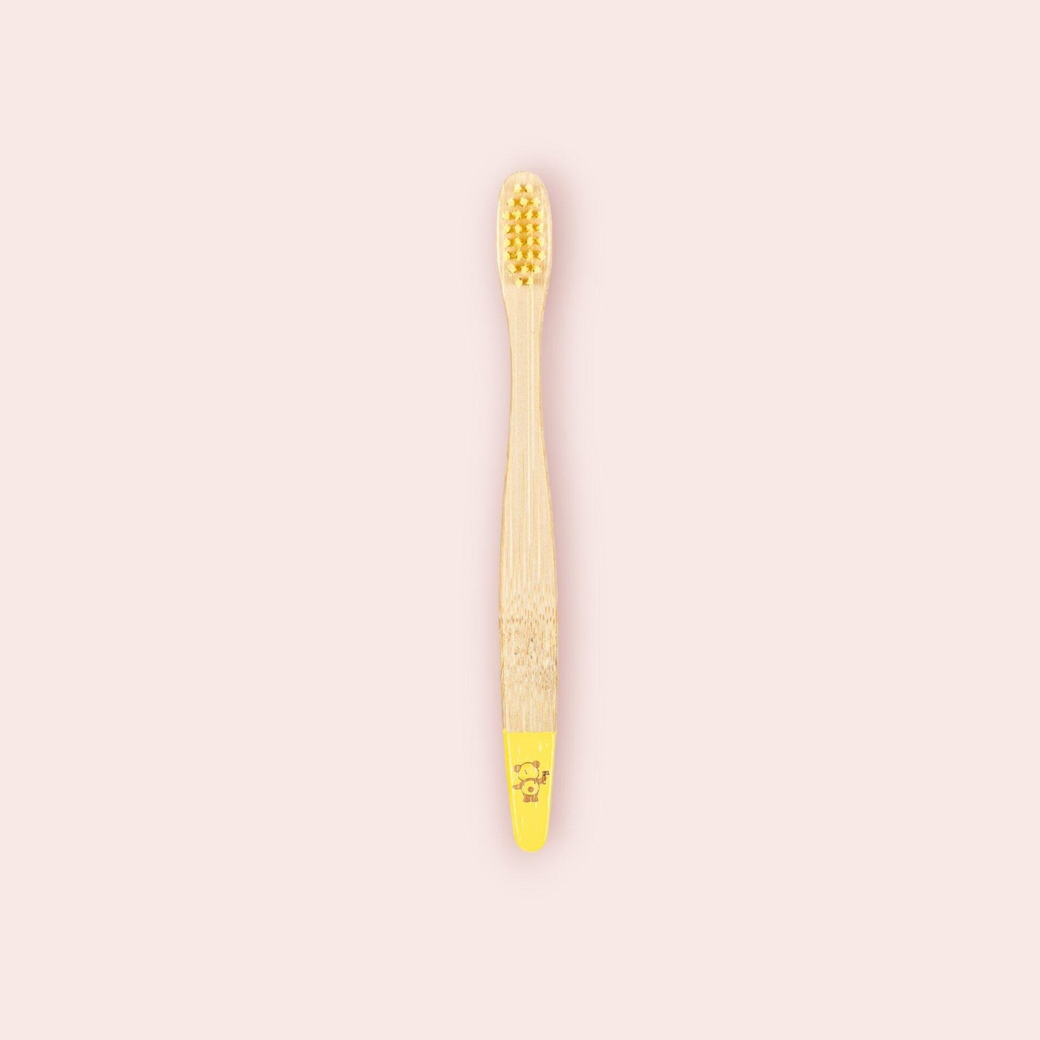  Une brosse à dents enfant jaune de la marque Cap Bambou