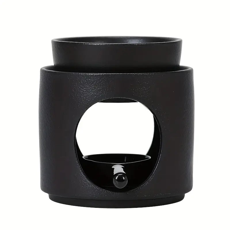 Brûle-parfum noir en céramique avec design circulaire moderne
