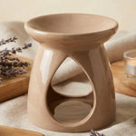 Brûleur céramique beige pour cire et huiles essentielles avec design goutte et accessoires aromathérapie