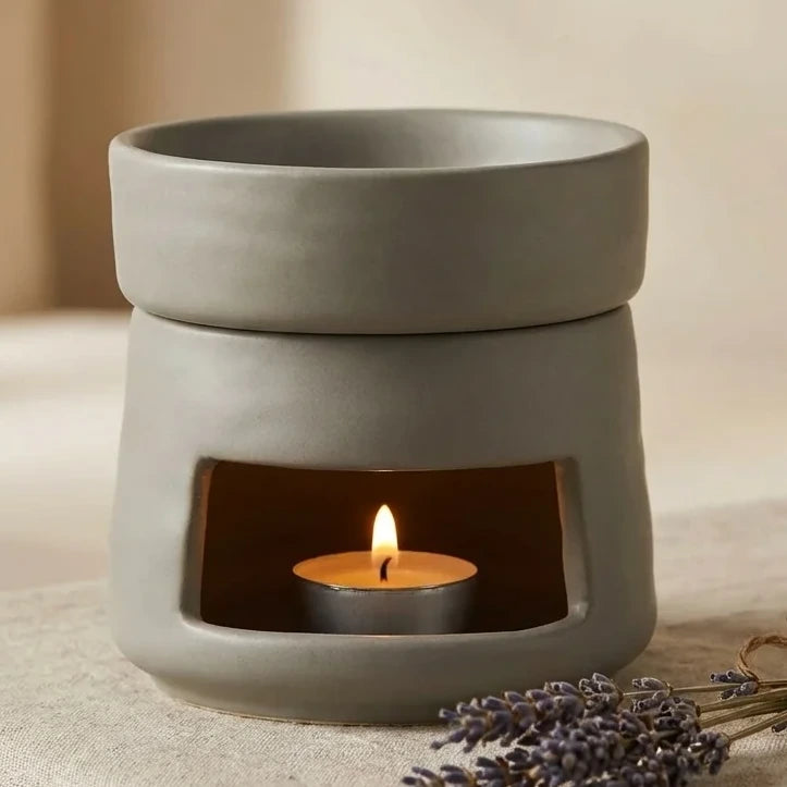 Brûleur de cire gris céramique avec huiles essentielles et bougie chauffe-plat