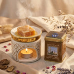 Carré d'Ambre Jamid Musc Blanc Hemani fondant dans un diffuseur de luxe