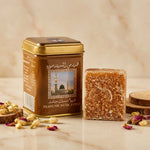 Carré d'Ambre Jamid Musc Blanc 30g Hemani en emballage bronze doré sur marbre