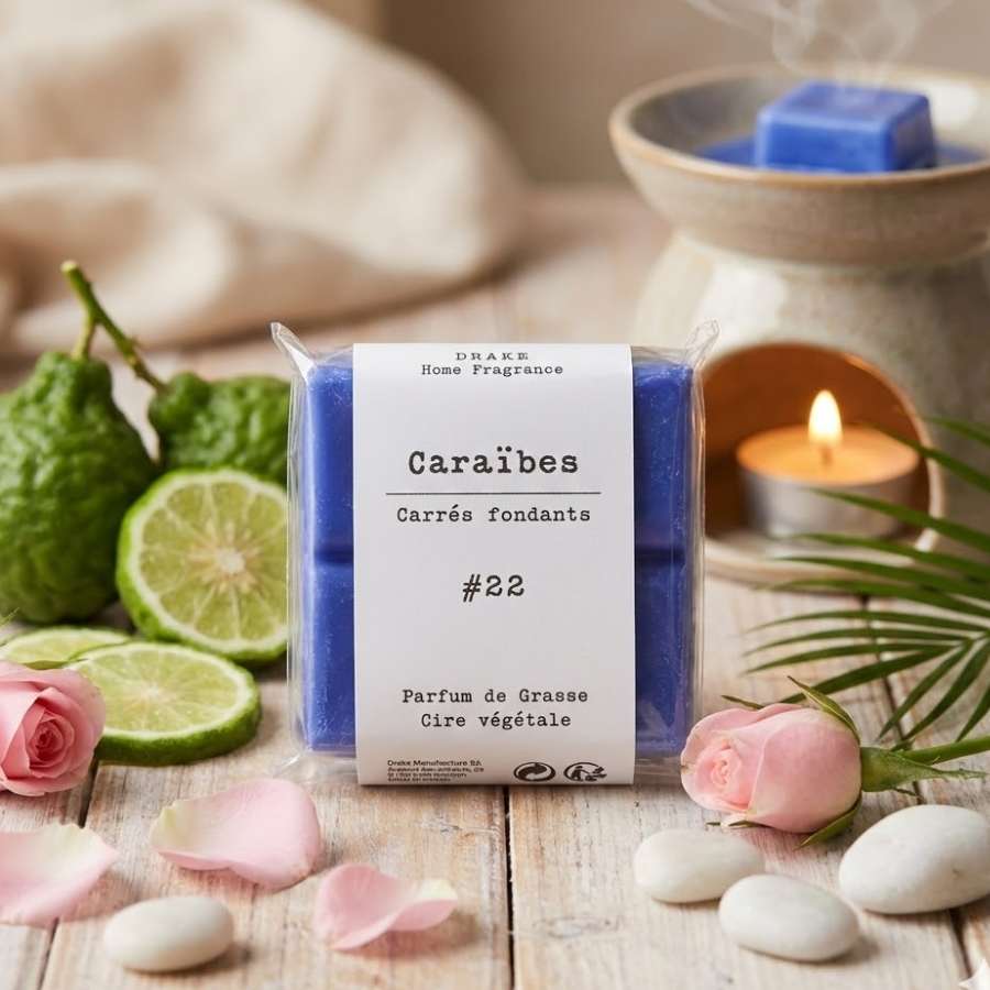 Un paquet de quatre carrés fondants Drake à la senteur Caraïbes sur une table en bois