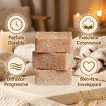 Carrés d'Ambre Coton Frais ByBazz fondants avec branches de coton et textiles doux en ambiance chaleureuse