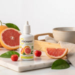 CITROSanté® extrait de pépins de pamplemousse bio avec fruits frais sur surface marbre