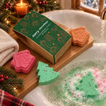 Coffret bombes de bain de Noël Ancien Wisdom : 4 pièces, sapins verts et pain d'épices dans une baignoire fumante