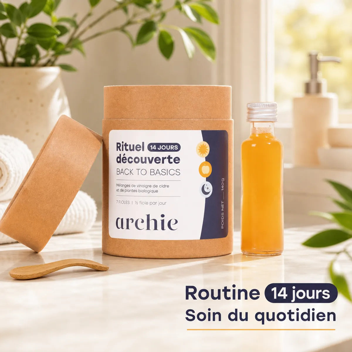 Coffret Découverte Routine Bio Archie 14 jours avec flacon, spatule bois et emballage kraft sur vanité