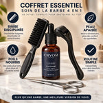 Coffret soin barbe 4 en 1 avec huile, peigne, ciseaux et brosse sur marbre blanc