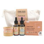 Coffret routine anti-âge pour peaux matures, contenant une crème solide à l'huile de noisette, un sérum hydratant, un sérum anti-âge, un savon à l'huile de Bourrache, et une trousse blanche