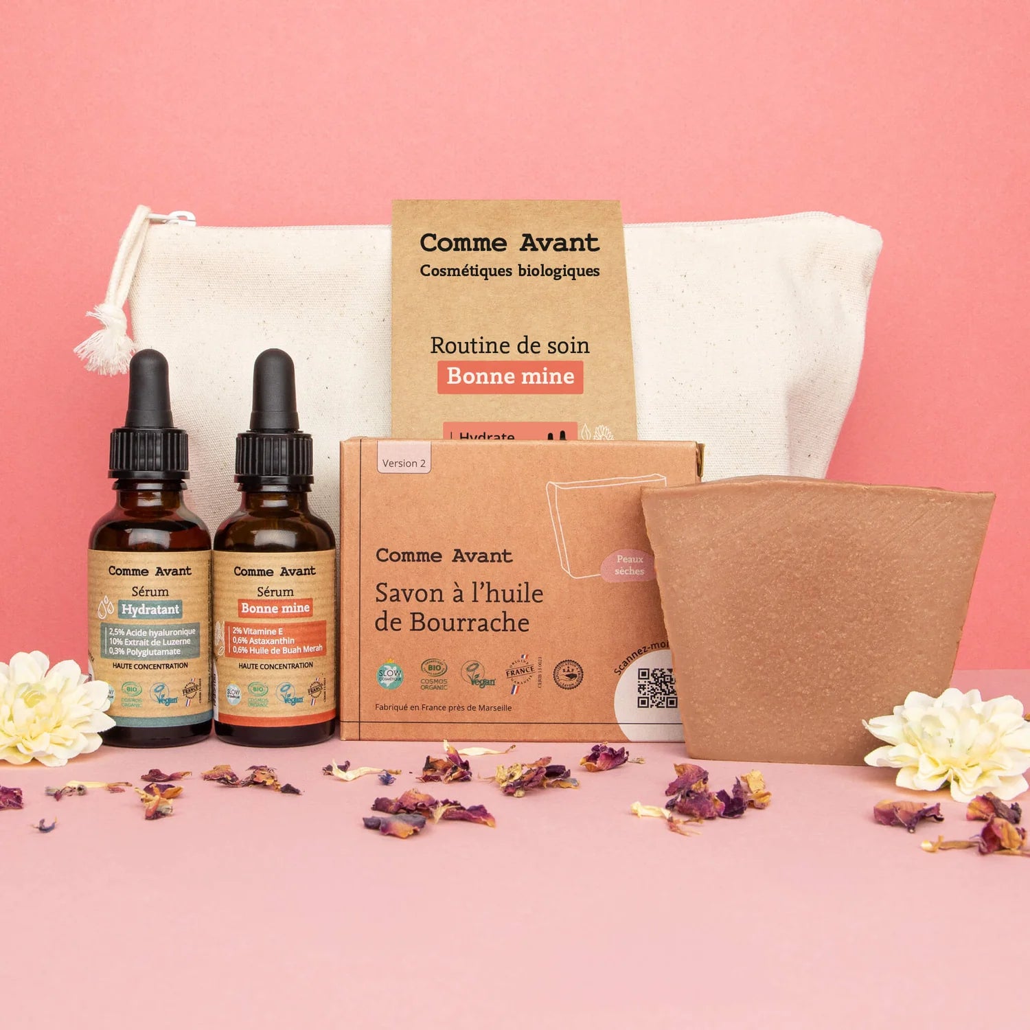 Un coffret routine de soin bonne mine sur fond rose de la marque comme avant