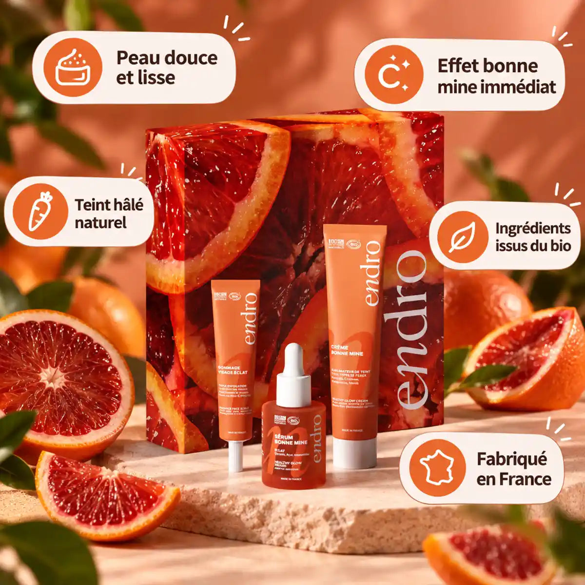 Coffret Zeste d'Éclat Endro bio : gommage, sérum et crème visage entourés d'agrumes, avec mentions bio et fabriqué en France