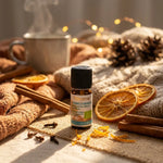 Flacon 10ml Florame Composition Cannelle-Orange Bio avec bâtons de cannelle et tranches d'orange frais