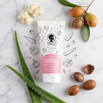 Crème de Shampoing Démêlante Noire O Naturel 200ml sur surface marbre avec ingrédients naturels