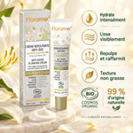 Crème Repulpante Anti-Âge Lys Perfection Florame bio 40 ml, tube et boîte sur fond nacré avec pétales de lys blancs