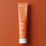 Crème bonne mine visage Endro sur fond orange