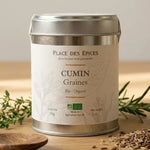 Cumin graine Bio 60g Place des épices sur surface bois avec herbes méditerranéennes