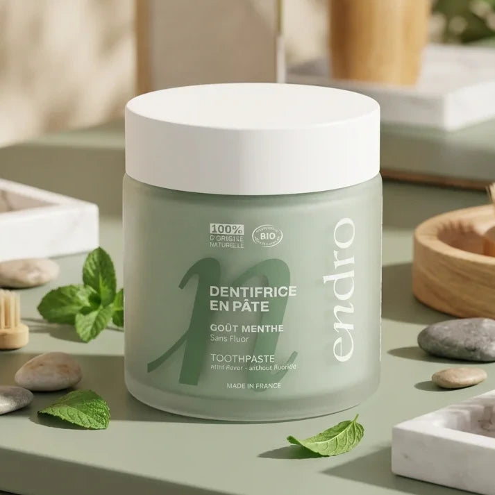 Dentifrice Endro Menthe 100ml en pot verre avec feuilles de menthe fraîche et galets