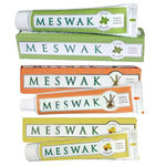 Photo prise de dessus de 3 tubes de goûts différents de Dentifrice Meswak Ayurvédique de Kerala Nature