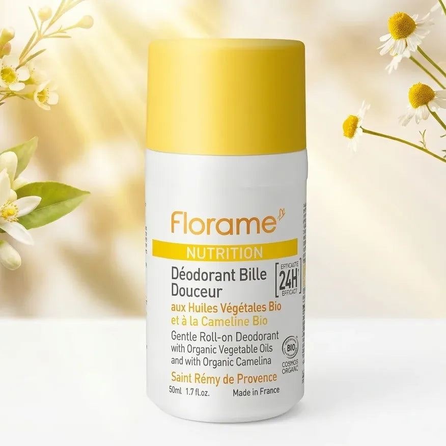 Déodorant Bille Douceur Bio Florame 50ml sur fond botanique avec lumière dorée naturelle
