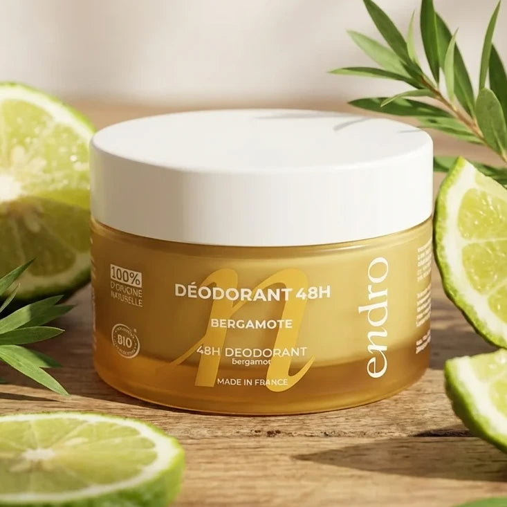 Déodorant solide Bergamote & Arbre à Thé Endro en pot verre doré sur surface bois