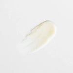 Texture crème du déodorant Endro étalée sur fond blanc, pour présenter la texture du produit.
