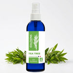 Eau florale Tea Tree Eolesens 200ml avec feuilles fraîches et gouttes d'eau sur fond blanc