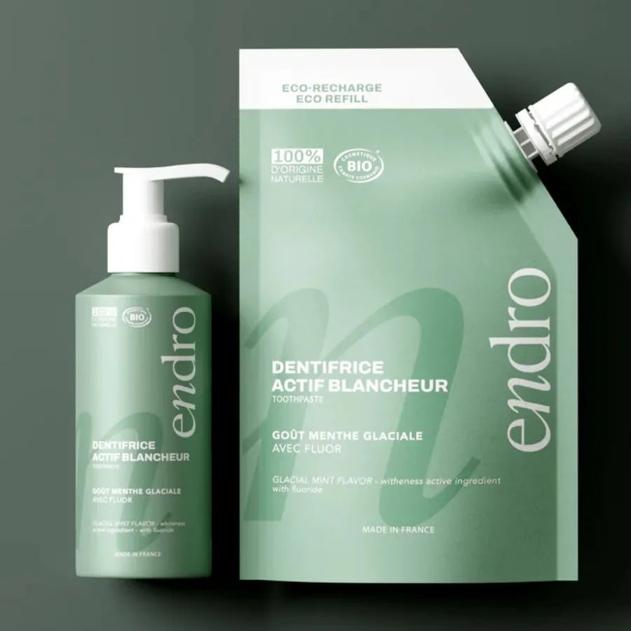 Une recharge de dentifrice menthe glaciale de la marque endro avec une bouteille de dentifrice