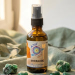 Huile de cristal Emeraude Ansil 50ml avec cristaux et éléments botaniques en ambiance wellness luxe