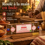 Encens Satya Oud 15g, bâtonnets roulés à la main par des artisans à Bangalore, Inde, sur un plan de travail en bois rustique