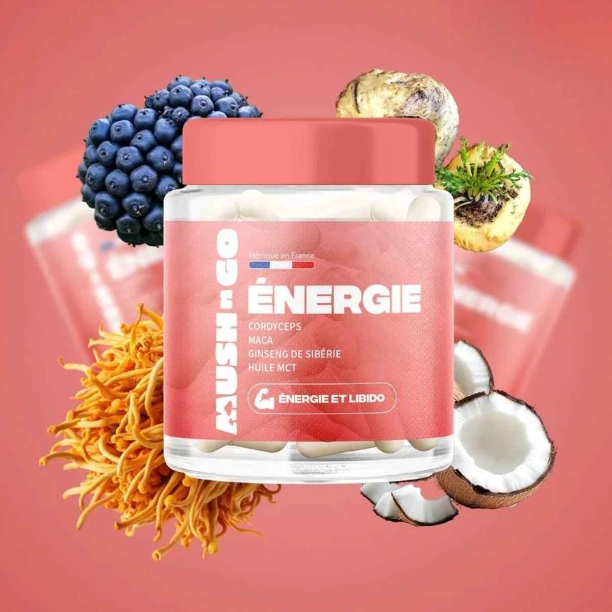 Bouteille Mush n Go Énergie ginseng cordyceps maca 30 gélules sur fond rose.