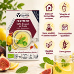 Ferment kéfir d'eau et fruits bio Yalacta, boîte entourée de citrons, figues et menthe, bocal de kéfir pétillant