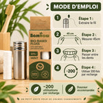 Fil dentaire Bambaw 50m en PLA avec guide d'utilisation en 4 étapes sur fond bois naturel