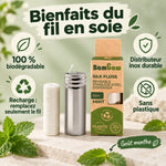 Fil dentaire en soie Bambaw dans son distributeur inox, avec recharge et boîte kraft, sur fond vert sauge, infographie bienfaits
