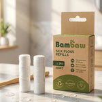 Fil dentaire en soie Bambaw recharges écologiques sur marbre avec brosse bambou