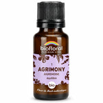 Flacon en verre ambré de fleur de Bach Agrimony (Aigremoine) Biofloral bio en granules, étiquette lavande, fond blanc